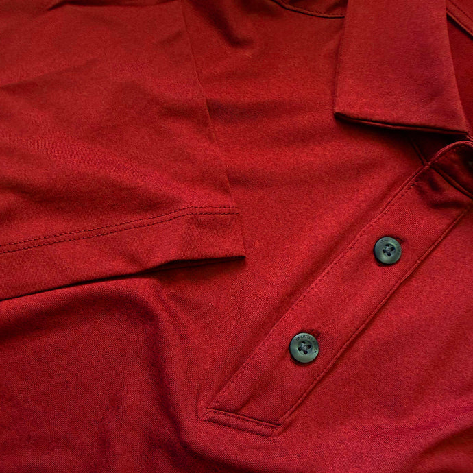 Close up image showing the red heathered Cutter & Buck polo