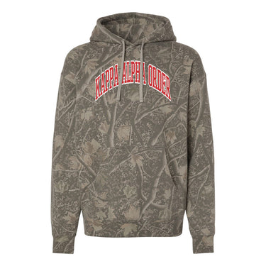 Kappa Alpha Deadwood Camo Hoodie featuring an all-over woodland camouflage print, red and white arched Kappa Alpha Order lettering, drawstring hood, and kangaroo pocket.