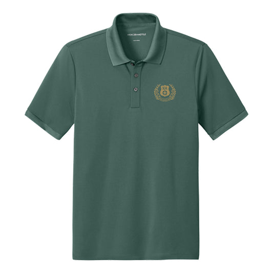 Front view of Green polo featuring embroidered laurel design.